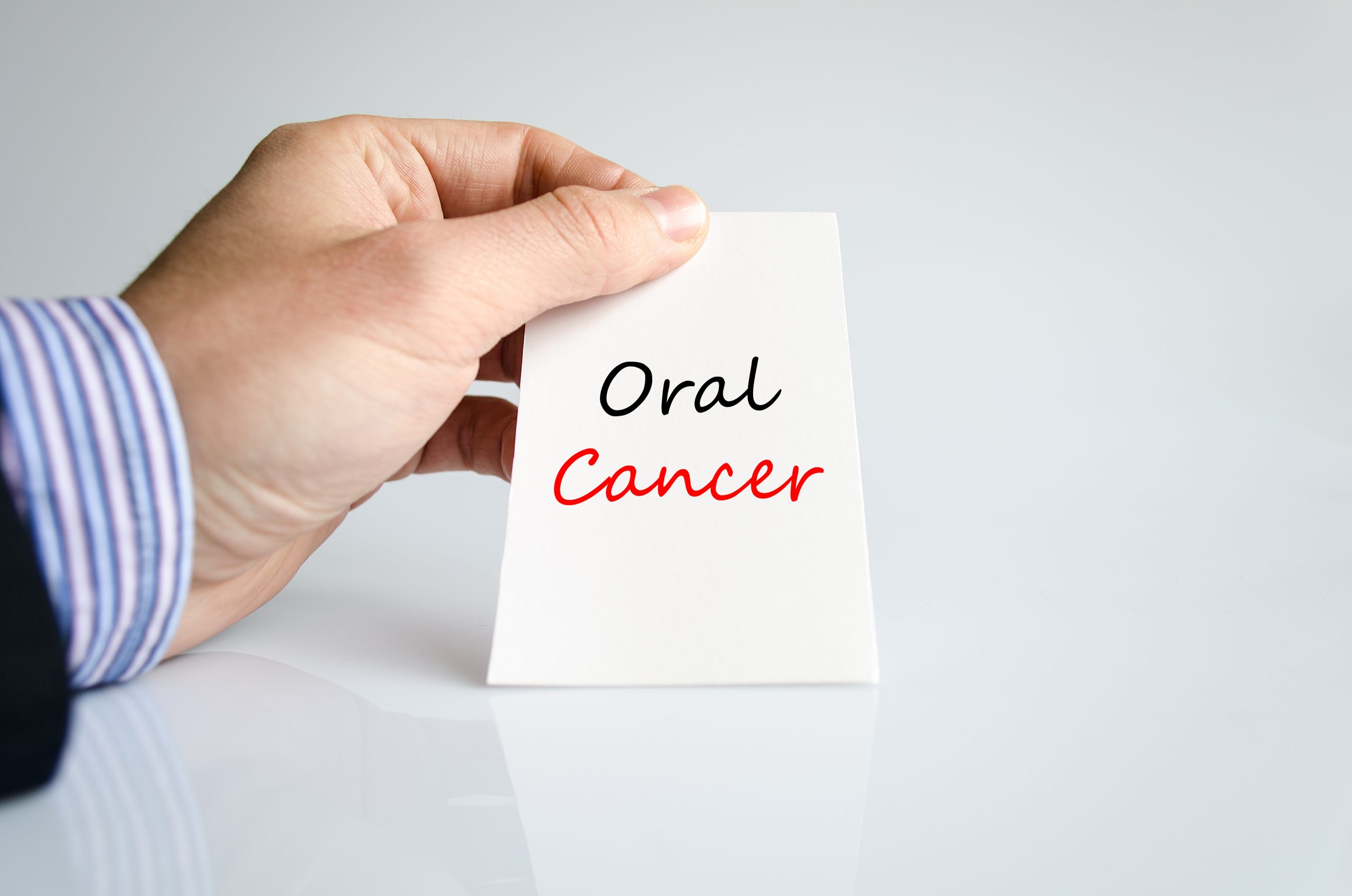 Oral cancer text concept isolated over white background